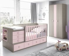 a baby's room with a pink crib, dresser and bed in it