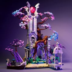 a building made out of legos with trees and flowers on the front, purple background