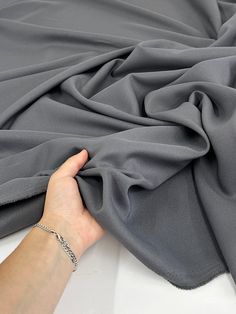 "This Gabardine is excellent quality! The fabric has a sleek finish and the color is rich and sophisticated. Ideal for tailored pieces" Hannah L., Verified Kikitextiles Customer ✅ Go for it anytime of the day, this GABARDINE isn't for any specific season. Kiki's Gabardine is a tightly woven fabric that is time resistant. It is durable and firm. This makes it a worthwhile investment and a sustainable choice that will last. The go-to outerwear fabric for centuries, gabardine twill is prized for it Fashion Garments, Go For It, Square Meter, Medium Weight, Woven Fabric, Investment, Sleek, One Piece, Square