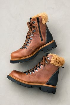 Whether your winter travels take you across town to grab hot chocolate or cross-country to check out beautiful new terrain, the water-resistant Cammie boots will transport you with warmth and style. These D-ring lace-up hiking boots are made from durable full-grain cowhide from Italy and feature a smooth leather panel at the heel and a burst of soft shearling adorning the rear collar. Italian wool lines the interior and footbeds for breathable wear and insulation on chilly days. TPR outsoles pro Waterproof Suede Boots, Distressed Leather Boots, Women's Winter Boots, Ankle Cowboy Boots, Riding Boots Fashion, Waterproof Leather Boots, Hiker Boots, Stylish Footwear, Leather Panel