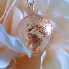 Rose Gold Leaf Resin Earth Globe Sphere Necklace Pendant Jewelry  Handmade rose gold globe earth planet sphere with a  world map necklace pendant charm made with uv resin and gold leaf stainless steel necklace chain perfect celestial astrological gift for her #resin #jewelry #handmade #etsy #rosegold #goldleaf #leaf #globe #necklace #jewellery #gift #feminine #celestial #planet #charm #pendant #pink #millennialpink World Map Necklace, Astrology Gift, Accessories Necklace, Stainless Steel Necklace, Resin Jewelry