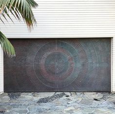 a garage door with an artistic design on it