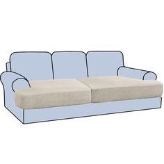 a blue couch with two pillows sitting on it's back legs and the seat up