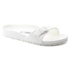 Madrid Essentials White Lightweight Slip-on Sandals, White Slip-on Footbed Sandals With Arch Support, White Sport Sandals With Buckle For Summer, Lightweight White Sandals With Arch Support, Lightweight White Sport Sandals For Outdoor, Summer Vacation Footbed Sandals With Arch Support, White Lightweight Sandals For Vacation, White Sandals With Arch Support For Outdoor, Lightweight White Sandals For Summer