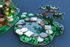 a lego model of a garden with lots of green plants