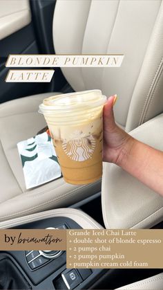 a hand holding a cup of coffee in the back seat of a car, with information about how to use it