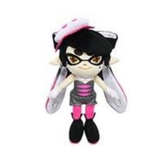 a stuffed animal doll with pink and black hair