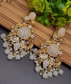 Crushed stone Earrings Rs 2100 only. #earrings #crushedstone #crushearrings #stonejewellery #kundanjewellery #bridaljewellery #zirconjewellery #hyderabadijewellery #traditionaljewellery #casualjewellery #casualwear #fatimajewels #karachi #lahore #islamabad #pakistan #uk #usa #uae #saudiarabia #partywear #bridalwear #jewellery #jewellerylovers #weddingseason #jewelsbyfatimakhan Stylish Jewelry, Fantasy Landscape, Gold Jewellery