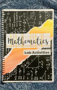 a notebook with some writing on it and the words, mathmatics lab activities