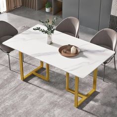 a white table with yellow legs and some chairs