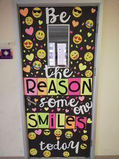 a door decorated with smiley faces and the words be the reason someone smiles today