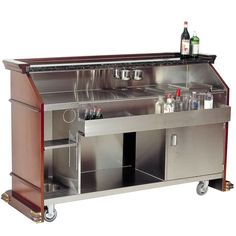 a metal bar with bottles and glasses on it