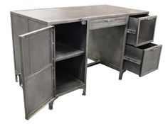 an industrial steel desk with two drawers and one door open to show the contents inside