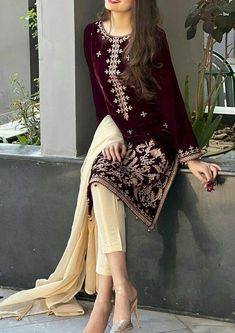 Winter wedding designer suit, wine colour velvet embroidered kurti with beige straight pant and dupatta is perfect for wedding functions, festival and party wear The kurti has beautiful resham thread embroidery with straight pant and dupatta This is customise outfit so If you want any changes in the outfit please contact us we will guide you as per your preference. ✨We assure you that we use only high quality fabric and threads to make any dress and you won't face any problem regarding fabric. ✨ Elegant Winter Sets With Dupatta, Elegant Semi-stitched Velvet Salwar Kameez, Velvet Long Sleeve Salwar Kameez With Resham Embroidery, Velvet Salwar Kameez With Dupatta And Long Sleeves, Velvet Long Sleeve Salwar Kameez With Dupatta, Designer Long Sleeve Velvet Salwar Kameez, Elegant Semi-stitched Velvet Kurta, Long Sleeve Velvet Salwar Kameez With Dabka Work, Elegant Velvet Salwar Kameez With Straight Kurta