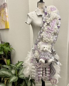 a dress made out of teddy bears and feathers