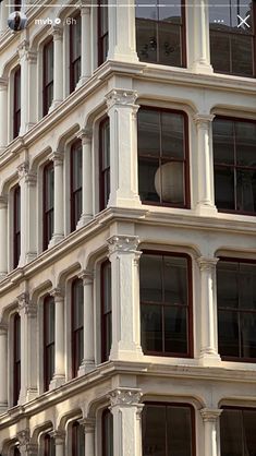 a large white building with lots of windows