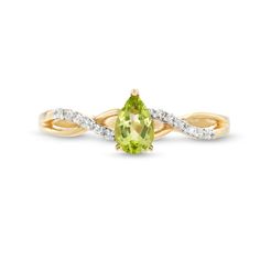 Capture your elegant and feminine style when you wear this pear-shaped green peridot and diamond loose braid ring in 10K gold. Crafted in warm 10K gold This look shines with a 6.0 x 4.0mm pear-shaped spring-green peridot center stone. Polished and diamond-lined ribbons create a loose twist design along the split shank. This ring sparkles with 1/20 ct. t.w. of diamonds. Loose Braid, Pear Shaped Ring, Loose Braids, Braided Ring, Sparkling Rings, Green Peridot, Split Shank, Spring Green, 10k Gold