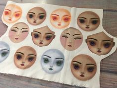 an image of many different faces on a piece of paper with eyes and nose shapes