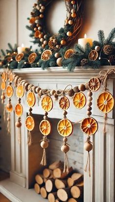 an orange garland is hanging on the mantle in front of a fire place filled with logs