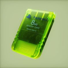 a green memory card case sitting on top of a table