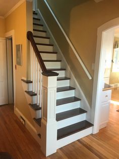 the stairs in this house are painted white