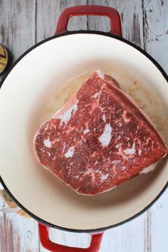 a piece of raw meat in a pot