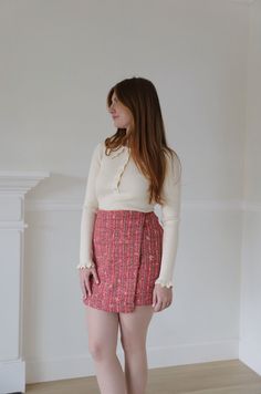 Expertly crafted from a vibrant pink tweed fabric, this skirt adds a pop of color to your wardrobe. Its wrap style offers a versatile fit, perfect for any occasion. Elevate your style with this colorful and timeless piece. pink colorful tweed wrap style mini length true to size zipper closure model is wearing a small Pink Tweed Skirt, High Waist Mini Skirt, Tweed Shorts, Pink Tweed, Tweed Mini Skirt, Tweed Skirt, Tweed Fabric, Wool Skirt, Wool Skirts