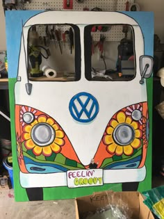 a vw bus painted to look like it has flowers on the front