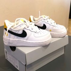 White And Black Nike Force1 Lv8 Baby/Toddler Shoes In Size 5c. Yellow Patch On The Back Stating "Have A Nike Day." In Box, Never Been Worn Except To Try On. Baby Sneakers Nike, White Scratch-resistant Sneakers For Playtime, White Sneakers With Soft Sole For Streetwear, Nike Non-slip Sneakers For Playtime, Nike Sneakers With Soft Sole For Playtime, White Sneakers With Round Toe For Playtime, Yellow Low-top Sneakers For Playtime, Cute White Nike Sneakers, White High-top Sneakers For Playtime