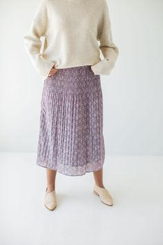 All your purple dreams will come true with the 'Destinee' midi skirt! Featuring a stunning pleated silhouette and a paisley print, this charming skirt is sure to add a touch of flair to any outfit. Pair with a cozy sweater and low ankle boots and a shoulder bag for a colorful yet subtle outfit for the colder weather! 100% Polyester Fully Lined Hand Wash Cold Hang or Lay Flat to Dry Do Not Bleach Cool Iron If Needed FINAL SALE: NOT ELIGIBLE FOR RETURN OR EXCHANGE Model Height 5'7" | Wearing Size Purple Flowy Pleated Skirt For Spring, Spring Paisley Print Flowy Maxi Skirt, Spring Flowy Maxi Skirt With Paisley Print, Spring Paisley Print Skirt, Purple Midi Skirt For Spring, Flowy Paisley Print Tiered Skirt, Flowy Tiered Skirt With Paisley Print, Flowy Long Skirt With Paisley Print, Flowy Long Paisley Print Skirt