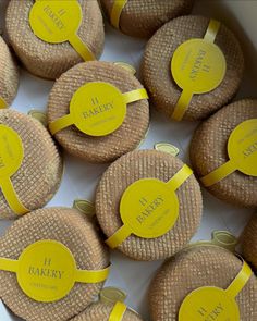 there are many round cookies wrapped in yellow paper