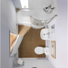 an overhead view of a bathroom with sink, toilet and bathtub