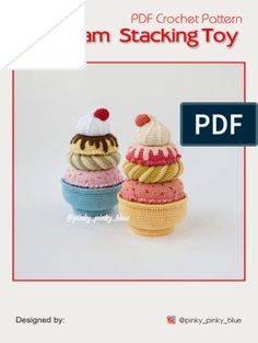 two crocheted ice cream cones sitting next to each other on top of a white surface