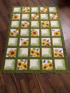 sunflowers and bees on green squares quilted onto the floor with wood floors