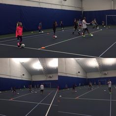 several people are playing soccer in an indoor gym with balls on the floor and one person is holding a tennis racket