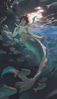 a mermaid is swimming in the ocean with fish around her and she looks like she's floating