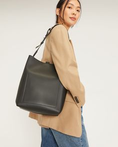 The Studio Bag Black – Everlane Rectangular Hobo Bag For Work, Classic Square Hobo Bag With Removable Pouch, Square Shoulder Bag With Detachable Strap For Work, Versatile Rectangular Business Bucket Bag, Rectangular Hobo Bag With Leather Handles For Work, Rectangular Bucket Bag With Detachable Strap For Work, Classic Square Hobo Bag For Everyday, Square Shoulder Bag With Adjustable Strap For Work, Everyday Rectangular Hobo Bag With Detachable Strap