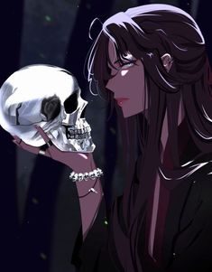 a woman holding a skull in her hand