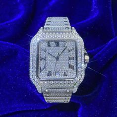 ICECARTEL exclusive Men's VVS Moissanite Watch is now available, made of stainless steel and PVD plated with a thick layer of 14K White Gold. This moissanite watch is iced out/bust down with round, colorless (D-Color), VVS moissanite flawless diamonds. All of the diamonds on this bust-down watch are guaranteed to pass the diamond tester. This mechanical moissanite watch features a self-winding mechanism that gets Its energy from natural motion of the wearer (mainspring).Every watch comes in an u Moissanite Watch, Custom Jewelry Box, Diamond Tester, Flawless Diamond, Vvs Diamond, Luxury Timepieces, Moissanite Jewelry, Mechanical Movement, Silicon Bands