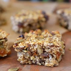 some granola bars are sitting on a cutting board