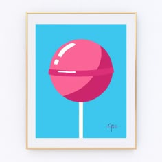 a pink lollipop on a blue background is featured in this minimalist art print