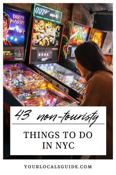 a woman playing pinball in new york with text overlay that reads 42 non - tourist things to do in nyc