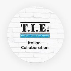 the italian collaboration logo on a white brick wall