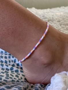 Casual Beaded Chain Bracelets For Summer, Colorful Adjustable Beaded Anklets, Handmade Heishi Bead Anklets, Beaded Anklets With Round Beads For Beach, Adjustable Anklet With Colorful Round Beads, Adjustable Beaded Anklet As A Gift, Adjustable Colorful Beads Anklets, Spring Beach Beaded Anklets, Summer Anklets With Tiny Beads