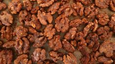 walnuts on a baking sheet ready to be cooked