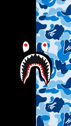 a bathing cap with a shark's mouth on it and blue camo background