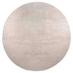 a round rug with a white background