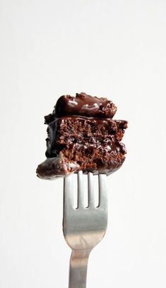 a piece of chocolate cake on a fork