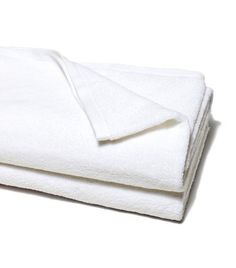 two white towels folded on top of each other