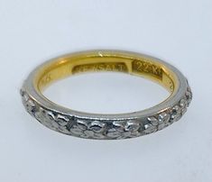 Thank you for viewing this beautiful antique Edwardian 1910's platinum and 22k wedding band.  It's hard to believe by observing the condition of this ring that it's over 100 years old.  The ring has personalized engraving.  The ring size is 4.5+.  It's approximately 2.5 mm wide and sits off the finger at approximately 1.8mm.  The weight of the ring is 4.7 grams.  It's manufactured by the Newsalt jewelry company.  The ring comes with an attractive gift box.  An important thing to mention regarding condition descriptions of antique and vintage jewelry is its judgement criteria which is very different than that applied to modern jewelry.  The expectation for modern jewelry classified as being in "excellent' condition is an item that is possibly high polished and in close to new condition.  An Edwardian Wedding Ring, Antique Jewelry Rings, Jewelry Companies, It's Hard, Modern Jewelry, Vintage Watches, 100 Years, Antique Jewelry, Wedding Band